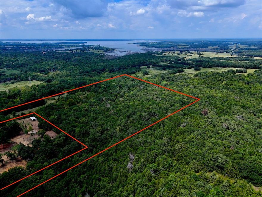 Beautiful piece of property less than a mile from the shores of Bois D arc Lake! Minutes from the the FM 1396 boat ramp and 20 minutes from Bonham, this tract offers the serenity of the country while keeping town at arms length. Great mix of mature timber, a native fruit trees, this property offers a canopy that gives you a unique sheltered feeling and enough topography to make for stunning sunrise views. Utilities are close by making this a great future homesite or a comfortable weekend escape. Local wildlife frequent and are often seen on the property.
