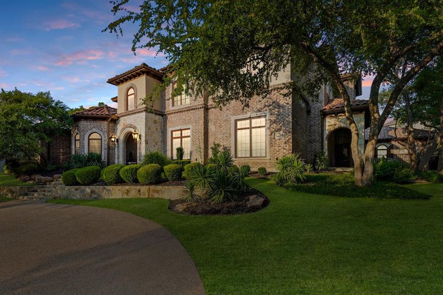 Welcome to this breathtaking estate tucked away on a sprawling .43-acre interior corner lot, perfectly situated in the heart of Trophy Club’s exclusive, gated Hogans Glen community. This impressive 5-bedroom, 5.5-bath masterpiece seamlessly blends sophisticated design with modern convenience, offering over 5,000 square feet of refined living space and a rare 4-car garage. Step outside and discover your own private resort: a magazine-worthy pool + spa, a fully equipped outdoor kitchen with a built-in BBQ and 2 built-in refrigerators, and a covered living area with motorized screens and a fireplace — an entertainer’s dream. Inside, the home is equally extraordinary. The chef’s kitchen is a culinary showpiece, featuring a massive island, custom cabinetry, and a full suite of new Viking appliances, including a 6-burner gas cooktop with griddle, double ovens, warming drawer, microwave, dishwasher, and ice maker. The spacious family room boasts exposed wood beams, a statement fireplace, and walls of windows that flood the space with natural light. The spa-inspired primary suite is a retreat unto itself, featuring a serene en-suite bath, a jetted tub with a new pump and controls, and direct patio access. An executive office and a secondary ensuite bedroom are also located downstairs for ultimate functionality. Upstairs, enjoy 3 oversized bedrooms with private baths, a game room, a fully equipped media room, and extensive built-in cabinetry. Major updates include new interior and exterior paint, refinished hardwood floors, high-end carpet, recessed lighting and HVAC vents, attic insulation, circular and side-load driveways, epoxy garage flooring, arched iron front door, shutters and electric window coverings, drainage system and sump pump, sprinkler wiring, HVAC units with scrubbers and UV lights, and a HVAC unit for the garage. Conveniently located just a golf cart ride from Trophy Club Country Club, and minutes from Hwy 114, Southlake, Westlake, and DFW Airport.