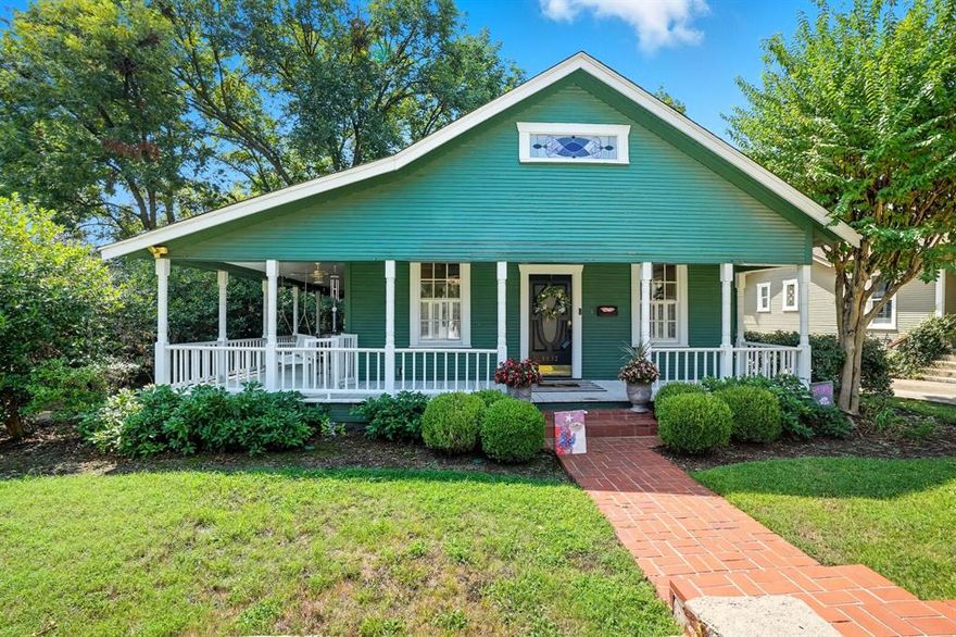 Welcome to 3817 Clarke Avenue, a beautifully preserved and thoughtfully updated Craftsman in one of Fort Worth’s most desirable locations. Just a short walk from the historic Bricks on Camp Bowie and minutes from the Cultural District and Downtown, this home offers the perfect blend of character, convenience, and comfort.  Inside, you’ll find hand-scraped hardwood floors that have been recently refinished, bringing warmth and timeless appeal throughout the main level. The home offers three spacious living areas and two dining areas, ideal for both everyday living and large gatherings. The downstairs living room features a cozy fireplace and built in bar, creating the perfect space for entertaining. Two additional living rooms, located on the main floor, offer flexible options throughout.  The updated kitchen boasts granite countertops, built-in cabinetry, and modern appliances, flowing seamlessly into the dining spaces. The private office is complete with built-in bookshelves, making it an excellent work from. home retreat. The primary suite, located on the main floor, includes a spacious bedroom and ensuite bath with dual sinks, separate shower, and soaking tub.  Major updates include a rebuilt front porch, all-new ductwork in the attic, and energy-efficient spray foam insulation, both in the attic and above two additional bedrooms, ensuring year-round comfort. Ceiling fans have been added in all main living areas for enhanced efficiency.  Outdoors, the entertainer’s back patio shines with decorative lighting and direct access to the living area with built-in bar, creating a seamless indoor outdoor lifestyle. With a large lot, mature landscaping, and a detached garage, this property has it all.  The combination of charm, location, and updates makes this home a rare find in one of Fort Worth’s most sought after neighborhoods!