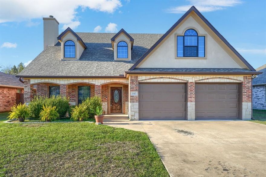 Welcome to this beautifully maintained storybook-style custom home offering charm, functionality, and thoughtful updates throughout. This two-story residence features the primary suite downstairs for easy living, with two spacious bedrooms, a full bathroom, and a large bonus room upstairs—perfect as a 4th bedroom, game room, media room, or second living area.

Step inside to find fresh interior paint, new blinds on every window, detailed crown molding and baseboards, and a warm, inviting atmosphere. The living room showcases a stunning stone wood-burning fireplace framed by vaulted ceilings, creating a true focal point that feels both cozy and grand.

The kitchen has an updated island and flows seamlessly into the main living areas—ideal for hosting and everyday living. The primary suite features two separate cedar lined closets, an ensuite, and a custom stone accent wall, giving the room a luxurious and serene feel.

Outside, you’ll enjoy a large backyard with plenty of space for entertaining, play, gardening, or future outdoor enhancements. Located in a quiet, well-kept neighborhood, this home has been meticulously maintained and has had no pets, offering a pristine move-in-ready experience.

Don’t let this storybook home pass you by—homes with this level of care and character are rare!