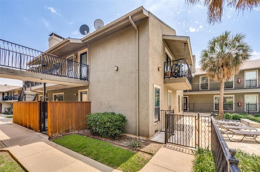Fresh and updated first-floor condo at Veneto! This two-bedroom plus study offers great views near the resort-style pool and features recent interior paint. Solid hardwood floors flow through the main living areas. The inviting living room includes a wood-burning and gas fireplace plus a cozy outdoor patio. The spacious bedrooms offer generous closets, and the primary suite includes an attached bath with separate tub and walk-in shower. A separate study, dedicated laundry area, and two covered parking spaces make this unique floor plan ideal for today’s work-from-home lifestyle.