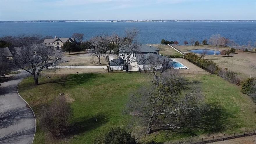 Rare Opportunity to Build Your Dream Estate in Exclusive Terrabella!
Enter a world of pure nature amidst some of the most refined homes and estates in Heath, TX, this property offers an ideal canvas for creating your exclusive lakeside estate!
It's your chance to secure the LAST homesite in the prestigious Terrabella waterfront community, an enclave of ONLY TEN estates valued in the $$$Millions$$$, offering breathtaking views of Lake Ray Hubbard. These homes capture the magic of living near the most calming element on earth. Situated on a 1-acre homesite, this exquisite property provides the perfect setting for your dream home, with a minimum requirement of 5,000 sq. ft. of air-conditioned space. For reference, a neighboring lot at 6 Terrabella Lane sold for $2,000,000 in April 2024, underscoring the exceptional value and exclusivity of this community. Experience luxury living with Heath's highly rated schools, located in the sought-after community of Rockwall, TX, often awarded by Money Magazine as one of the top ten places to live, and within a 35-minute drive to the working hubs of Dallas and Collin Counties, convenience meets serenity.