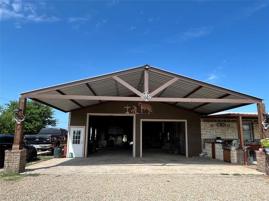 Convenient access to major Highway 67! This charming 5.405-acre property features a well-maintained doublewide manufactured home, sitting on a solid concrete slab and offering a dining addition with a beautiful country view. 
Ideal for outdoor entertaining, The property includes a custom stone outdoor kitchen, complete with a stainless steel grill and fully functional sink—perfect for hosting gatherings. 
This charming country home also includes a spacious 2,125 sq ft event building, currently used for family gatherings. Featuring an inviting stone fireplace and open space, This building offers endless possibilities!