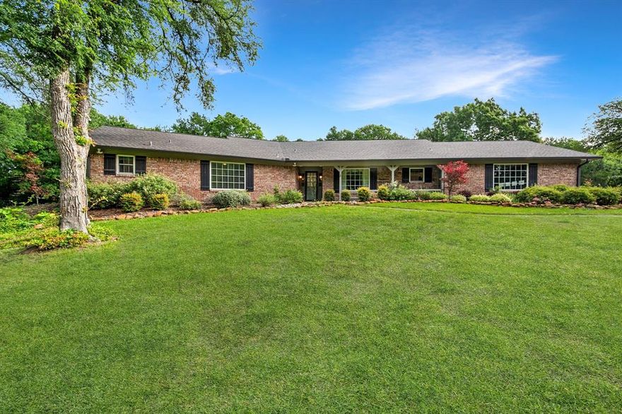 Tucked away at the end of a quiet, tree-lined drive, this beautifully crafted 4-bedroom, 2.1-bath custom home offers 2,340 square feet on 2.495 acres of peaceful country living just outside the Corsicana city limits. Accessed by a charming wooden bridge, the property feels like a hidden retreat, nestled deep within a serene, park-like setting that provides both privacy and natural beauty. Step inside to find a thoughtfully designed layout featuring a formal dining area and a spacious living room filled with natural light. Expansive windows frame picturesque views of the lush backyard, bringing the outdoors in and creating a warm, inviting atmosphere perfect for relaxing or entertaining. The home also includes a 2-car garage with durable epoxy flooring, offering both function and style. For those who need extra workspace or storage, the property truly shines with its fully equipped detached shop. Complete with heating, cooling, water access, and a full-length workbench, this versatile space is ideal for hobbyists, craftsmen, or small business use. One of the most distinctive and valuable features of this property is the extensive kennel and animal pen setup, previously used by Quail Run Kennel. This unique infrastructure presents an incredible opportunity for an animal rescue operation, boarding facility, or a 4-H enthusiast looking to expand their projects. With its combination of custom craftsmanship, peaceful surroundings, and specialized amenities, this one-of-a-kind property offers endless possibilities for those seeking space, privacy, and a lifestyle connected to nature.