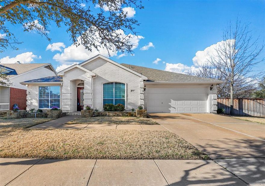 This Impeccably kept home is NOW receiving a beautiful Brand-New ROOF offering peace of mind and added value for the next owner! Welcome to this captivating 4-bedroom, 2-bathroom home perfectly situated on over a quarter acre corner lot in the highly sought after Park Palisades Addition. The 4th bedroom is a versatile flex space, perfect for a home office, art studio, playroom or bedroom with a walk-in-closet. Fresh landscaping enhances the home's curb appeal, while inside, new interior paint, updated lighting, and stylish new hardware on all doors create a modern and inviting atmosphere. Step inside to discover gleaming hardwood floors flowing through the two main living areas where a stunning wood-burning fireplace adds warmth and charm, perfect for those TX sized winters. The fully remodeled owner's suite bathroom is a true retreat, offering modern finishes and a spa-like feel. The home is designed for both comfort and style featuring new ceiling fans throughout, freshly painted kitchen cabinets & island to include sleek stainless-steel appliances.  With a thoughtful layout, ample space, and tasteful updates, this home is move-in-ready. Amenities to include a neighborhood swimming pool & picnic area. Easy Access to Chisholm Trail Tollway, & I-20. Close to great schools, hospitals, restaurants & shopping. Highly Suggest viewing virtual tour. Welcome Home!!