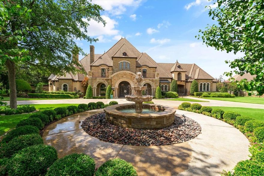 Built by Randall Sears in 2005, this 1.2 acre estate offers a realm of grandeur and timeless elegance. The living room boasts 30-foot ceilings adorned with decorative cathedral-style beams. With five generously appointed bedrooms, each graced by en-suite bathrooms and spacious walk-in closets, it's a haven of comfort and privacy. It offers three distinct study areas, two welcoming living rooms, media room, and a gym with reinforced steel beams designed to accommodate heavy weights, positioned above the six-car garage. Outdoors, a spa-like pool beckons, featuring a waterfall, hot tub, slide, fire feature, and a covered outdoor entertaining porch. Architectural details are abundant, with hand-scraped hardwood, travertine, brick, and tile mosaic floors, complemented by groin and barrel vaults, a wood-beam coffer, a softly back-lit skylight, creating an inviting and airy ambiance throughout. The gourmet kitchen, equipped with top-tier Wolf and Sub-Zero appliances.
