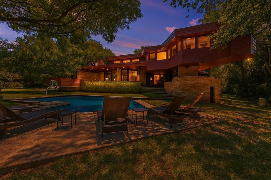 A Rare Architectural Masterpiece in Prestigious Overton Park. Nestled at the secluded end of Autumn Drive, this architectural marvel is a once-in-a-lifetime opportunity for the discerning buyer with an appreciation for design and artistry. Created by renowned Fort Worth architect Larry Morton Gernsbacher, AIA—a protégé of Frank Lloyd Wright’s Taliesin West—this mid-century modern masterpiece embodies geometric elegance, organic harmony, and timeless sophistication. Commissioned in 1957 by Leon and Fay Brachman, the 6-bedroom, 5-bathroom estate spans an impressive 6,387 square feet of intricately designed multi-level living space, accentuated by warm wood tones, custom stonework, and an abundance of built-in furnishings. Expansive walls of glass frame the lush canopy of mature trees, flooding the home with natural light while seamlessly blending indoor and outdoor living. The recently enhanced chef’s kitchen is a work of art in itself, featuring sleek custom cabinetry, top-of-the-line appliances, and a panoramic northwest-facing wall of windows, offering breathtaking views of the manicured grounds. A striking central stone fireplace anchors the dramatic great room, an awe-inspiring space that exemplifies depth, dimension, and architectural ingenuity. Designed for elevated entertaining, this estate boasts an outdoor oasis with a sparkling pool, a private firepit lounge, perfect for hosting gatherings beneath the Texas sky. A hidden wet bar, elegant formal and casual dining areas, and expansive open-concept interiors further enhance the home’s inviting yet sophisticated ambiance. Set on nearly an acre of pristine landscape, this estate offers unmatched privacy while being just minutes from upscale shopping, fine dining, and the vibrant cultural scene of Fort Worth. With its breathtaking design and seamless integration of nature and modern luxury, this home is a true architectural gem, awaiting its next curator to take it to the next level.