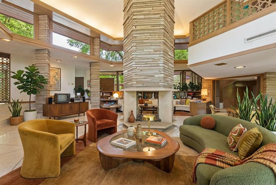 A Rare Architectural Masterpiece in Prestigious Overton Park. Nestled at the secluded end of Autumn Drive, this architectural marvel is a once-in-a-lifetime opportunity for the discerning buyer with an appreciation for design and artistry. Created by renowned Fort Worth architect Larry Morton Gernsbacher, AIA—a protégé of Frank Lloyd Wright’s Taliesin West—this mid-century modern masterpiece embodies geometric elegance, organic harmony, and timeless sophistication. Commissioned in 1957 by Leon and Fay Brachman, the 6-bedroom, 5-bathroom estate spans an impressive 6,387 square feet of intricately designed multi-level living space, accentuated by warm wood tones, custom stonework, and an abundance of built-in furnishings. Expansive walls of glass frame the lush canopy of mature trees, flooding the home with natural light while seamlessly blending indoor and outdoor living. The recently enhanced chef’s kitchen is a work of art in itself, featuring sleek custom cabinetry, top-of-the-line appliances, and a panoramic northwest-facing wall of windows, offering breathtaking views of the manicured grounds. A striking central stone fireplace anchors the dramatic great room, an awe-inspiring space that exemplifies depth, dimension, and architectural ingenuity. Designed for elevated entertaining, this estate boasts an outdoor oasis with a sparkling pool, a private firepit lounge, perfect for hosting gatherings beneath the Texas sky. A hidden wet bar, elegant formal and casual dining areas, and expansive open-concept interiors further enhance the home’s inviting yet sophisticated ambiance. Set on nearly an acre of pristine landscape, this estate offers unmatched privacy while being just minutes from upscale shopping, fine dining, and the vibrant cultural scene of Fort Worth. With its breathtaking design and seamless integration of nature and modern luxury, this home is a true architectural gem, awaiting its next curator to take it to the next level.