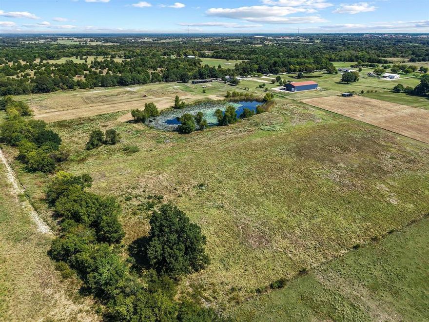 Positioned on 36 sprawling acres, this unique property offers unmatched opportunity for business, income, and lifestyle. The expansive land provides both beauty and function, anchored by a peaceful pond that enhances the setting for recreation or event hosting. With 36 acres of usable land, a prime property is a rare find for investors, entrepreneurs, or those seeking a country lifestyle. The possibilities are endless, and the return on vision could be substantial.