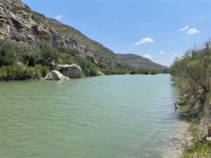 Amazing 3271.68+- acres with over 3 miles of Pecos River Frontage...located just down stream from spring fed Independence Creek Junction. The River offers fishing, swimming, rafting, kayaking or just relaxing as you float down the clear waters.  Terrain is awesome with mountains rising from the River valley. Deep draws  with native brush and trees cut through the mountains. The cover and browse is ideal for the wildlife and hunting is excellent... the river naturally supplies plenty of water for the wildlife to thrive.  Hackberry Creek winds thru the ranch. The ranch offers roads traversing over the mountain and down to the river. Water well and electricity are on site.  This is a must see!!