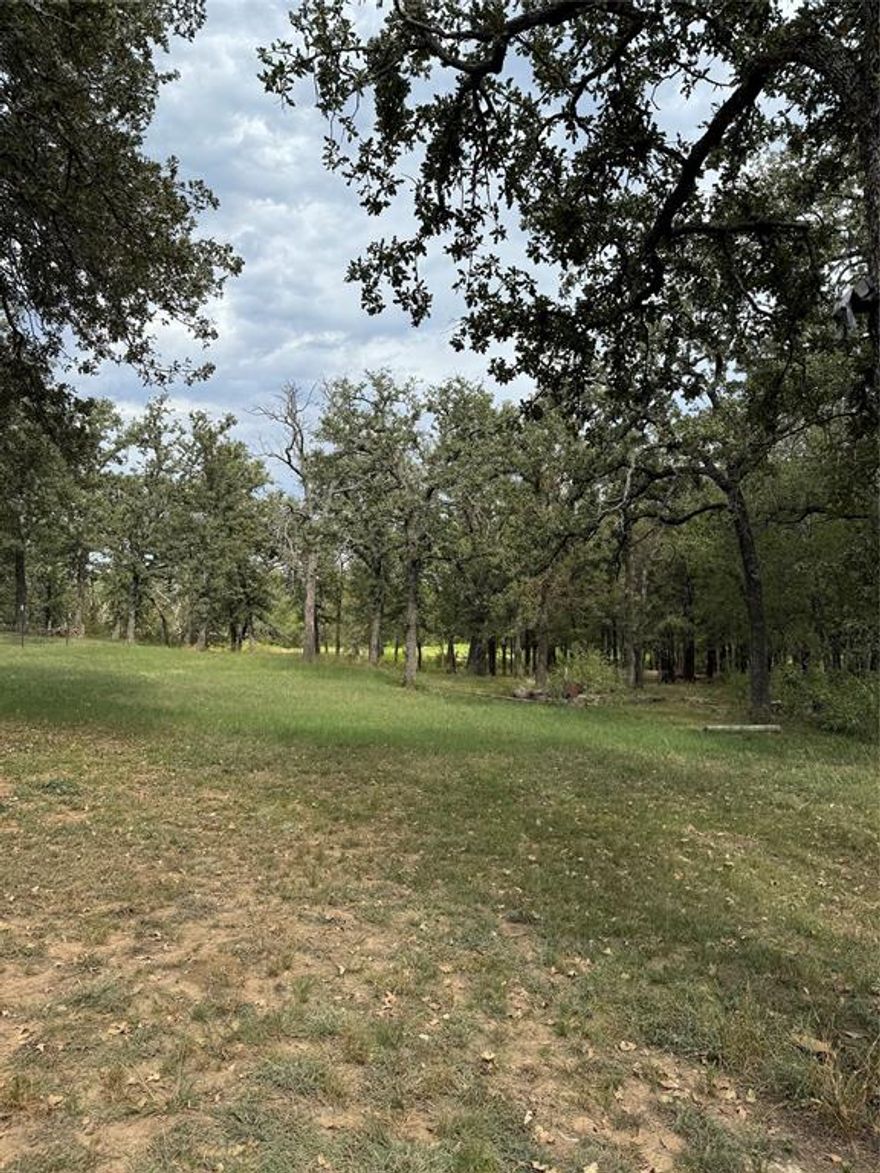 Hard to find waterfront lot in Valley View! Picturesque view with scattered oak trees that ease to the water. Electricity ready and septic tank already installed.  Lots of possibilities!  Build new or bring your mobile home.  Bring your offers!