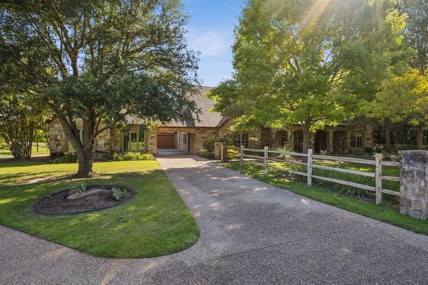 Welcome to 4377 Annetta Centerpoint Road, a stunning 4-bedroom, 4.5-bathroom sanctuary set on 10 private acres in the heart of Aledo, Texas—where serene country living meets rustic elegance. As you approach the property to your private gate, you’ll be greeted by a picturesque landscape framed by mature trees, lush greenery, and timeless curb appeal. Step inside and be captivated by the light-filled, open-concept living area with soaring ceilings and large windows that invite the outdoors in. The seamless flow between the living, dining, and kitchen areas creates a warm and inviting atmosphere—perfect for relaxed family gatherings or elegant soirées. At the heart of the home lies a chef’s dream kitchen, featuring stainless steel appliances, a professional-grade gas cooktop and range, a butler’s pantry, and an elegant wine room that adds both sophistication and function. Retreat to the spacious primary suite, a true haven of tranquility, complete with a luxurious en-suite bathroom with dual vanities, a soaking tub, and a separate walk-in shower. Enjoy your mornings or evenings in the vaulted-ceiling sunroom, surrounded by views of your expansive land. Step outside to your private backyard oasis, where 10 acres of open space provide endless possibilities. Whether it's sipping coffee on the patio, going for a swim, or simply enjoying the peaceful sounds of nature, this property is a canvas for your ideal outdoor lifestyle. Located in the highly sought-after Aledo Independent School District and just minutes from charming local shops, dining, and scenic parks, this estate offers the perfect blend of privacy, beauty, and convenience. Experience the best of both worlds in this captivating Aledo retreat.