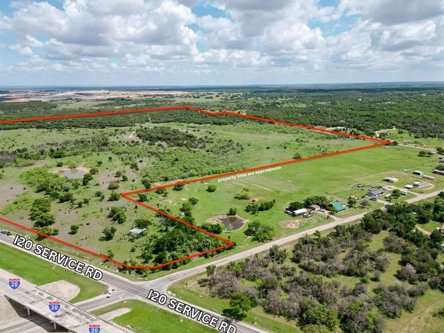 Located in one of the fastest growing corridors west of the Dallas Fort Worth Metroplex, this exceptional 131 acre tract offers a rare combination of location and future potential. With approximately 1500 feet of frontage along the south side of Interstate 20 service road and an additional 1800 feet of frontage on Live Oak Road, the property provides excellent visibility, access, and development flexibility. Positioned less than one mile east of the highly sought after 281 and I20 interchange, this location sits directly in the path of continued growth. The land features gently rolling terrain with a mix of dense hardwoods and open prairie, offering both scenic beauty and functionality. Currently fenced for cattle, the property includes two stock tanks and is well suited for agricultural use, recreation, or future development. Seller believes they own all mineral rights and will convey.
