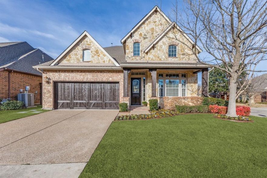Stunning Home on Corner Lot. Located in a distinguished gated neighborhood, just minutes to White Rock Lake. This beauty is lock and leave or everyday living. The fab look of this stylish home starts at the drive up. Stone and brick elevation, refreshed landscaping with a warm and inviting front porch. Step inside to high ceilings, natural light, large Island Kitchen for dining and entertaining, double ovens, SS appliances, gas cook top, granite counter tops with extra counter space. Open Living looks over the back porch and yard with large windows meant for relaxing, entertaining or play.  Primary and secondary bedroom down. Primary offers a large space with sitting area, ensuite bath offers jetted tub, separate shower, dual vanity sinks and large primary walk in closet. Family friendly floorplan with 3 large bedrooms, 2 full baths and large living room up. One of the bedrooms has ensuite bath the other has extra storage closet.  Neighborhood has Park with Playground and separate Dog park located only a quick distance away. Updates include, Solar System PAID IN FULL, Average Electric Bill is prox $35 per month, per seller. 2026 Updates include, New Fence, Replaced 2 Fence Gates, New Sod Grass in Front and Side Yard, Refreshed Landscape, Exterior Stain, Garage Doors Updated Stain. Sprinkler System Heads, Nozzles Serviced. 2025 HVAC Upstairs Replaced and much much more.  A Must See