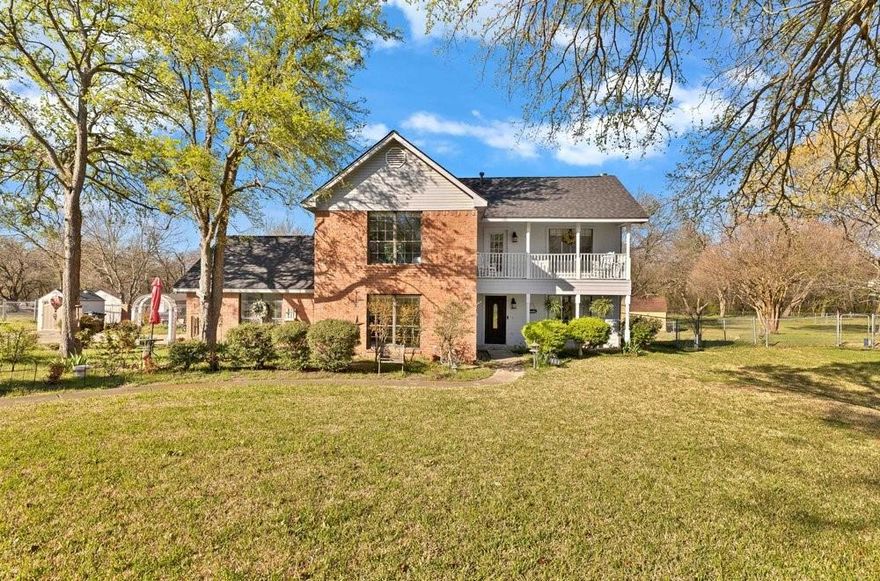 A rare opportunity to own a one-of-a-kind home on a full acre backing to a peaceful creek. 
This two-story property offers the space, character, and layout that’s getting harder to find in Crandall. With charming country-style curb appeal featuring a blend of brick and siding, it stands apart from typical homes in the area.
Inside, you’re welcomed by a warm and inviting living space centered around a gorgeous fireplace, creating a cozy feel from the moment you walk in. The layout includes 4 bedrooms and 2.5 baths, highlighted by an oversized primary suite downstairs.
Upstairs, a secondary primary-style bedroom with its own fireplace offers a private retreat ideal for flexible living arrangements. The additional bedrooms are all generously sized, providing more space than you’ll typically find.
The kitchen features abundant cabinet storage, a gas stove, and flows into a dedicated dining area with a bay window and built-in cabinetry.
Enjoy multiple outdoor living spaces including a front porch, back porch, and balcony. The property extends to a scenic creek at the rear, adding natural beauty.
Major updates include a recently installed high-grade, impact-resistant roof 
If you’ve been waiting for something with land, character, and a layout that stands out—this is it.