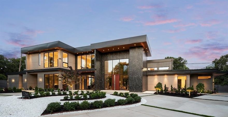 Nestled on an expansive .82-acre cul-de-sac lot in prestigious Preston Hollow, this newly constructed architectural marvel exudes unparalleled sophistication with 8500 SF in main house and a 600 SF casita. The marble slab cladding & circular driveway offers the WOW factor upon arriving at this masterpiece. Step inside & be greeted by soaring 20’ ceilings and walls of glass that flood the home with natural light, creating an atmosphere of luminous refinement. The flawless first-floor design seamlessly integrates form and function, with formal living and dining areas adorned with a double-sided marble fireplace, luxurious wall paneling, & magnetic LED lighting. The stylish club room features high-top tables, a sleek bar, & a climate-controlled wine cellar. Sliding glass walls artfully separate the expansive gourmet kitchen, a culinary showpiece appointed with stone countertops, double islands, sleek Florense cabinetry, Thermador appliances, & designer lighting. A spacious pantry & separate back kitchen ensure flawless functionality. Just beyond, a media room invites guests to indulge in cinematic experiences or relax in casual luxury. The primary suite is a private sanctuary with a spa-like bathroom clad in porcelain onyx and marble, a dramatic black bathtub, impeccably appointed closets and built-in coffee bar. A secondary upstairs suite, an additional laundry room, and a stunning flamed Azure marble staircase with glass railing and walnut treads further elevate the home. Outdoor living is a symphony of luxury, boasting a heated pool with a mesmerizing Alex Turco water feature, a sunken firepit, an outdoor kitchen, and a turfed yard adorned with cherry trees and landscape lighting. A private casita with a kitchenette, full bath, and sauna offers impeccable guest accommodations or wellness retreat. Completing this modern marvel is a 4-car garage enhanced with designer lighting and bespoke wall coverings. This is the pinnacle of modern luxury living in Preston Hollow.