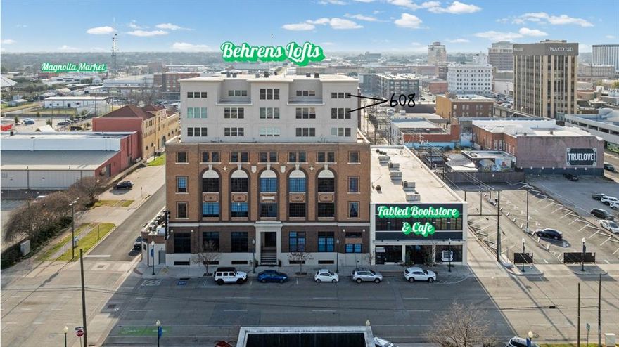 Rare opportunity to own a piece of historic Waco. This exceptional two bedroom, three full bathroom residence occupies the top two floors of the iconic Behrens Lofts, originally constructed in 1913 as the headquarters of the Behrens Drug Company, one of Waco’s earliest and most influential pharmaceutical businesses. Opportunities of this caliber rarely come available. Located minutes from Baylor University, this two-story loft is ideal for Baylor alumni and game-day living, with flexibility for potential income-producing use when not in residence. Enjoy dramatic ceiling heights, abundant natural light, and sweeping views of the Brazos River, Historic Suspension Bridge, ALICO Building, and McLane Stadium. Set in the heart of downtown, just blocks from Magnolia Market at the Silos and near the Dr Pepper Museum, with walkable access to dining, shopping, and entertainment. The building offers reserved parking, a fitness center, and is adjacent to Fabled Bookstore & Coffee shop. Buyer to verify STR eligibility.