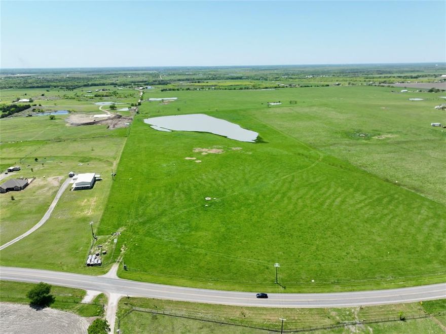27.713 acres of gorgeous pasture land on a FM 1722 featuring a massive seven acre stock pond. If you need a premium site for a new home or simply enjoy a place in the country to raise cattle and watch spectacular sunsets, then there's no better option in Ellis County. There's a gated entrance into the property, electricity is at the road, and water service is available from Rockett SUD. Shopping and schools are accessible within minutes. Easy access to either I-45 or I-35E from FM 879. DFW airport is less than an hour away.