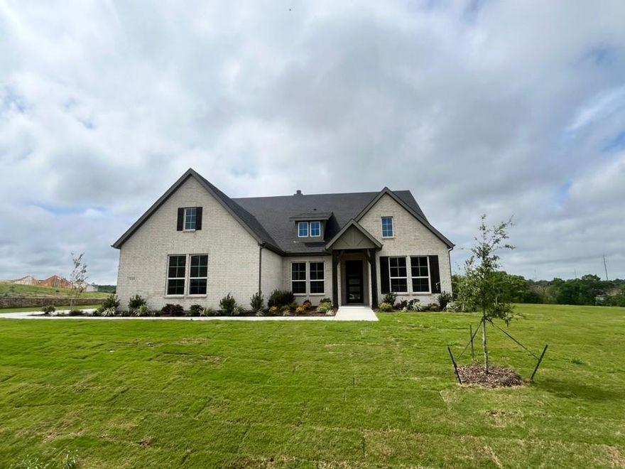 Estimated April 2026 completion! Ask us about our Trade In Trade Up program, we can buy your home! With 4 bedrooms, 3 bathrooms, and a flex room, this plan boasts just over 2,400 square feet of functional living space. Upon entering the home off the front porch, you enter the foyer. To the left is a hallway with a bedroom, walk-in closet and full bathroom, as well as a linen closet. Across the foyer is a flex room, perfect for a home office, formal dining room. Past the foyer is the family entry, with storage space and mud bench, which leads to the laundry room and three car attached garage. The home opens up to a large family room with a stately fireplace. Next to the family room is a gourmet kitchen, with a walk-in pantry, a large island. Next to living area is a dining space which overlooks the covered back patio. A hall leads to two bedrooms with walk-in closets, another linen closet and a shared full bathroom. The primary ensuite featuring a large walk-in closet and bathroom with a dual-sink vanity, standalone tub and glass shower.Located on a homesite over 1 acre, this home includes split secondary bedrooms, and an open concept. Includes an open dining space, and an additional study-flex room! SPRAY FOAM ENCAPSULATED!
