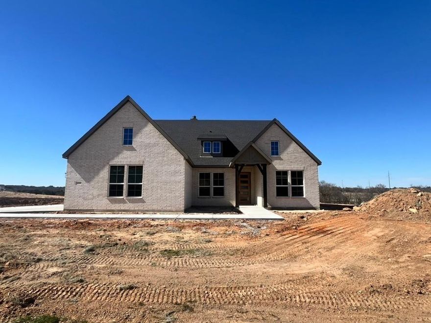 Estimated March 2026 completion! Ask us about our Trade In Trade Up program, we can buy your home! With 4 bedrooms, 3 bathrooms, and a flex room, this plan boasts just over 2,400 square feet of functional living space. Upon entering the home off the front porch, you enter the foyer. To the left is a hallway with a bedroom, walk-in closet and full bathroom, as well as a linen closet. Across the foyer is a flex room, perfect for a home office, formal dining room. Past the foyer is the family entry, with storage space and mud bench, which leads to the laundry room and three car attached garage. The home opens up to a large family room with a stately fireplace. Next to the family room is a gourmet kitchen, with a walk-in pantry, a large island. Next to living area is a dining space which overlooks the covered back patio. A hall leads to two bedrooms with walk-in closets, another linen closet and a shared full bathroom. The primary ensuite featuring a large walk-in closet and bathroom with a dual-sink vanity, standalone tub and glass shower.Located on a homesite over 1 acre, this home includes split secondary bedrooms, and an open concept. Includes an open dining space, and an additional study-flex room! SPRAY FOAM ENCAPSULATED!