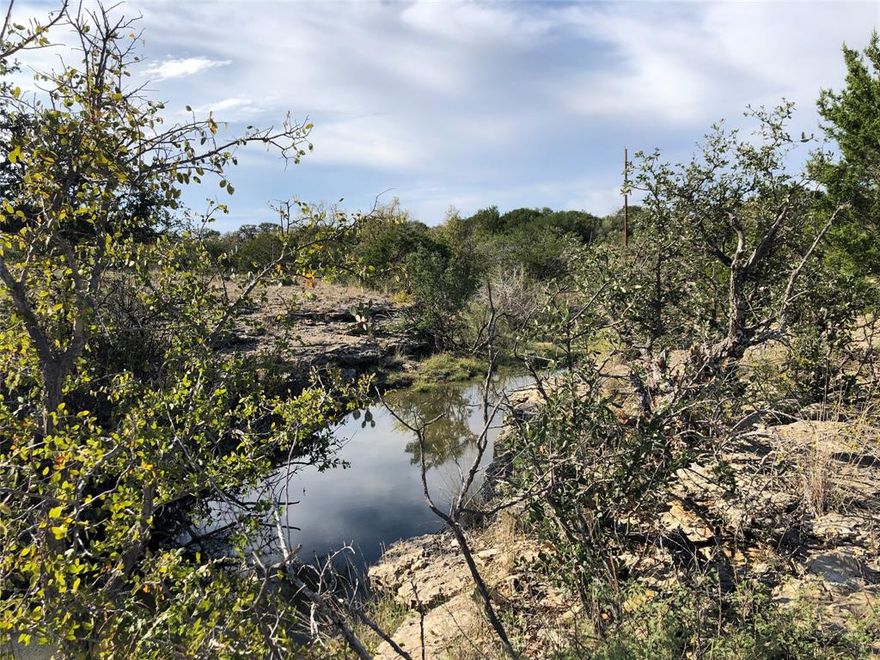 Welcome to this stunning 654-acre wildlife haven, nestled in the heart of  deer county, spanning both Brown and Coleman Counties. This property is a true paradise for outdoor enthusiasts, offering an ideal blend of natural beauty and wildlife-rich terrain. Muke Water Creek meanders along the western boundary, providing a picturesque water feature that attracts diverse wildlife, including deer, turkey, and wild hogs. The land boasts a combination of flat to gently rolling hills, along with varied trees and brush, creating an exceptional habitat for the abundant wildlife that calls this place home. The rocky cliffs along the draws enhance the natural landscape and feed water into Muke Water Creek, ensuring a sustainable water source for both the wildlife and the land. Additionally, three stock tanks are strategically placed across the property, providing ample water for cattle and wildlife alike. With electric and rural water services available, this property is perfectly equipped for a variety of recreational, residential, or agricultural pursuits. Whether you're looking for a hunting retreat, a wildlife sanctuary, country living, or simply a scenic escape, this property offers it all.