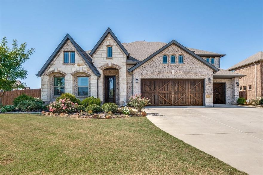 MOTIVATED SELLER!! BRING YOUR PICKY BUYERS!! WHY WAIT TO BUILD WHEN YOU CAN OWN THE MODEL!! Situated on a corner lot in the highly desirable Triple Diamond Ranch, this Bloomfield 5-bedroom open-concept model home is loaded with builder and owner upgrades that include high grade hardwood flooring, upgraded light fixtures, custom window drapes, a stoned fireplace and stairway with wrought iron finishings, an epoxy 3-car garage, custom painted mudroom, and gourmet kitchen that includes stainless steel appliances, a large kitchen island with breakfast bar, and painted cabinets with added handles. The spacious primary bedroom features a sitting area and a large bathroom with separate vanities, a stand-up shower with a bench, a garden tub, and a walk-in closet. Upstairs provides even more space where both an upstairs game room and media room reside. As you step into the backyard, you’ll enjoy the extended patio that leads to a shed equipped with electricity and a vent to cook outdoors! Add in the quick access to highways, shops, parks, and schools, and you have everything you need and more!