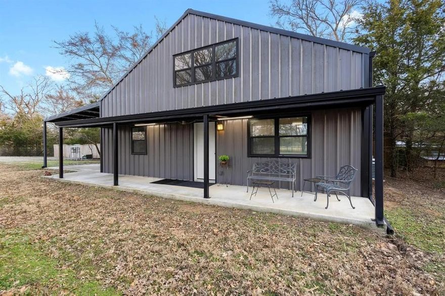 Two story 1286 sq. ft custom-built barndominium on an attractive two-acre property with mature trees. Two bedrooms and 2 full baths. Downstairs bedroom is a flex area that can be used as a den, rec room or office. Attached 480 sq. ft spacious covered carport accommodates two vehicles with a protected walkway to the front door. Underground electricity to the home.
 High-speed Internet, TV cable, and water meter are installed. The property is fenced on all sides with pipe and cable fencing at the road. Heavy-duty automatic security gate. 

Traditional 8-inch fiberglass insulation on exterior walls and roof. All interior walls are insulated for sound. Energy-efficient mini split AC and heating units and insulated windows. Sealed concrete floors downstairs with plank flooring on the second. Large capacity septic system in place for building additional home. Heavy duty gravel driveway with underlayment for stabilization. 50-amp, sewer and water RV hookups also on site.

Located on State Highway 78 just four miles north of Bonham. Minutes from Walmart, Brookshires, Starbucks, Tractor Supply, Fix n Feed, Auto Zone, Whataburger, and other restaurants and businesses. Close to Lake Bonham, the new Bois D'arc Lake and Caddo National Grasslands. Enjoy fishing, hunting, horseback riding, and more. A great place to escape the grind of city life, retire or keep as a weekend retreat. Could be potentially an income-producing Airbnb property.