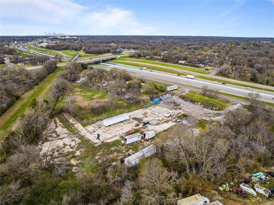 Located just 11 miles from downtown Dallas, this 175-highway frontage, 2.26-acre lot, offers great freeway visibility. Previously a feedstore now cleared out for the next business to take over. The building has been removed with the 14,620 sq ft foundation ready for a new building to be put in place, this lot is a perfect blank slate for a new business. Water, septic, electricity, and loading ramps, are in place for the next owner.