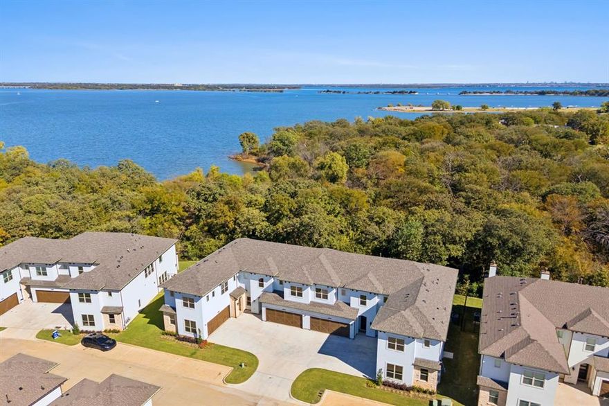 This property may be eligible for up to $10,000 in a Buyer Assistance down payment grant with builder's preferred lender! This is a great opportunity to make home ownership more affordable. Contact agent for more details. Located along the coveted shoreline of Lewisville Lake, Water’s Edge is a luxury, townhome-style, mid-rise condominium residence in Lake Dallas. Nestled amidst a perpetual forest of trees, you’ll discover an oasis of natural beauty with all the urban conveniences and entertainment close at hand. With magnificent lake views and a waterfront deck, you’ll love coming home to Water’s Edge. Built by Crescent Estates, they offer 5 different floorplans ranging from 2087 square feet to 2372 square feet, 2 and 3 bedrooms plus game room, study and or loft. Unit 719 features the Bermuda floorplan. Residents also have access to lakefront clubhouse, fitness center & community pool. Condos are Fannie Mae approved!