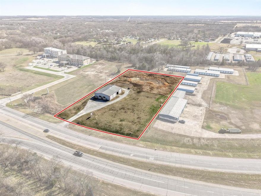 LOCATION LOCATION LOCATION. Located at the intersection of highway 121 and highway 56, this makes the ideal spot for a business. The building is 4800 square feet total, has 2 big shop doors in the back, and a show room in the front with a couple office. With an open floor plan, it would be easy to make this building the ideal spot for your business.