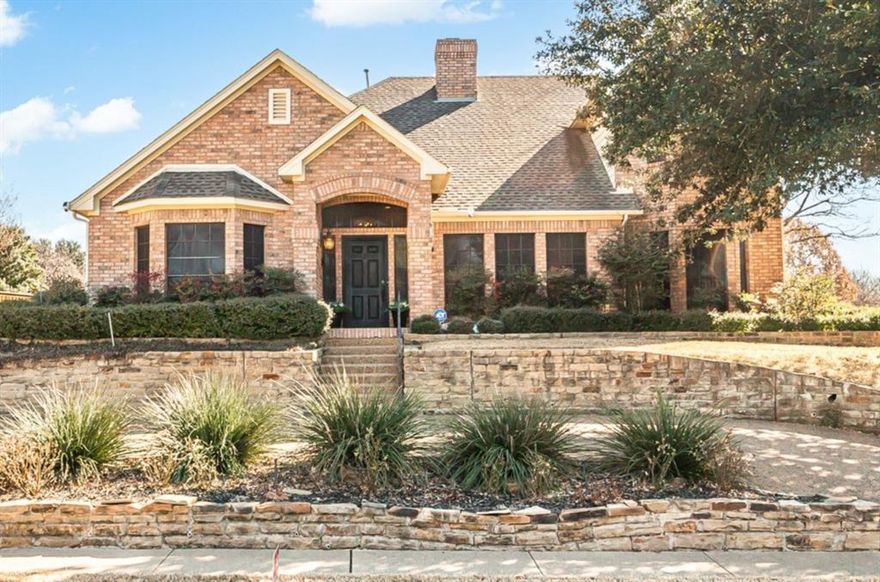 Beautiful custom home in the desirable Greens neighborhood near Firewheel Golf Park, Firewheel Town Center, and easy access to PGBT. This 4-bedroom, 3-bath home offers 2,876 sq ft of versatile living space on a .32-acre lot. Designed for comfort and entertaining, it features 3 living areas and a see-through fireplace. The oversized kitchen includes granite countertops, tile backsplash, large island, under-cabinet lighting, coffee bar and a walk-in pantry. Fresh white paint, updated lighting and brushed nickel hardware create a bright, modern feel. Mature trees, covered patio and an upstairs balcony enhance the backyard. A 3-car garage, circular front drive and 2 rare walk-in attics provide exceptional storage.