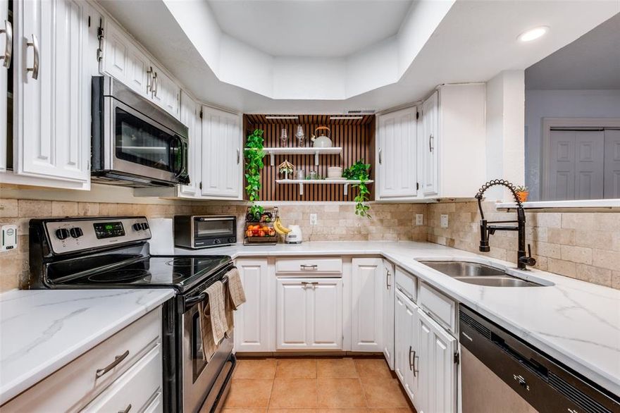 Discover this stylish 2-bed, 2-bath condo in the heart of Oak Lawn. A perfect city condo, it offers a bright and open living space with large windows, a warm fireplace, and new flooring that flows effortlessly into a modern kitchen. The recently updated kitchen features stainless appliances, Refrigerator, modern aesthetics, abundant cabinetry and a convenient layout ideal for entertaining. Both bedrooms are generously sized with good closet space and both bedrooms are en-suite! The primary suite offers an extra large room with a brand new renovated bathroom! The unit has had new electrical, water heater, and new bathrooms installed in the last 2 years. The washer and dryer will stay with the unit. Outside, you’ll appreciate the covered front porch and easy-access parking plus a walkable location near vibrant restaurants, nightlife, shopping and downtown. Whether you’re relaxing inside or enjoying the lively Oak Lawn scene just steps away, this condo blends comfort and convenience perfectly. Ready to call it home!