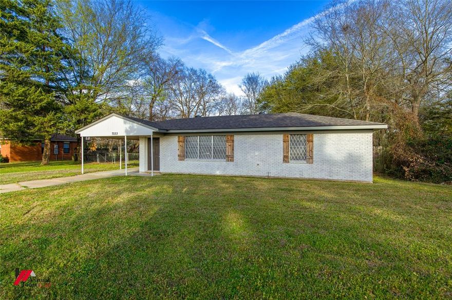 ATTENTION FIRST TIME HOME BUYERS!!  Why pay rent when you can own this MOVE IN READY gorgeous house for less than rent!  New paint, new architectural shingled roof, and more!   All brick home on half acre lot with double gate to huge backyard, with storage shed! Less than 5 minutes to I-20!  Beautiful wood-like floors, no carpet!    Refrigerator, washer, dryer remain! (works but not warranted).  Ceiling fans in most rooms! Call me or your Realtor to schedule a private showing!  Agent Related To Seller.   Photos coming Friday!