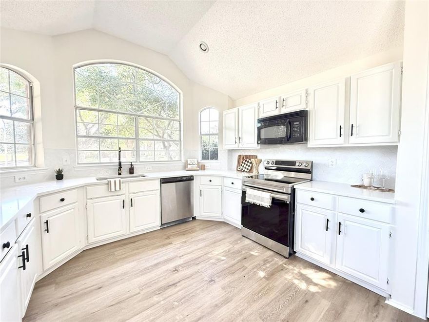 Welcome home to this beautifully renovated 3-bedroom, 2-bath property in the highly desirable Park Glen community, located within Keller ISD and just steps from Arcadia Park and Trails. ***Qualified buyers can receive a 1.75% of loan amount credit offered through Sunflower Bank.*** This single-story home combines modern updates with timeless comfort. The freshly updated interior features wide-plank LVP flooring, vaulted ceilings, and abundant natural light throughout. The kitchen showcases Carrara White quartz countertops, a stylish backsplash, stainless-steel appliances, and a breakfast nook that opens into the inviting living area with a gas fireplace. The spacious primary suite offers a private retreat with a frameless glass shower, garden tub, dual vanities, and walk-in closet. Additional highlights include fresh interior paint, new light fixtures, faucets, and ceiling fans, plus a recently tuned HVAC system with professionally cleaned ducts for added peace of mind. Enjoy evenings on the covered patio overlooking the large backyard with park views, or take advantage of nearby community trails, playgrounds, and green space. With its prime location near shopping, dining, and major highways, this move-in ready home blends style, function, and convenience in one of Fort Worth’s most established neighborhoods.