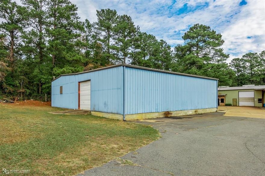 Prime industrial opportunity in Minden located off Industrial Drive. This property features approximately 24,670 square feet of office and warehouse space situated on 1.4 acres and is zoned industrial, making it ideal for a variety of business uses.

The front portion of the office has been recently remodeled, offering updated workspace along with individual offices, a kitchen, and a bathroom. A recently added studio apartment provides additional flexibility for on site living, rental income, or office use. The upstairs area has also been converted into an unfinished apartment, offering future potential for expansion or customization.

The warehouse space includes 7 large overhead doors, multiple work areas, and has been reconfigured with access adjustments including separation from the long hallway warehouse section. The neighboring property has been sold, and a fence has been installed to define the boundary. A new 2 inch water line is also being installed, adding value and utility to the property.

While some equipment has been sold, including CNC equipment and most punch presses, several key pieces will remain with the property. Included equipment consists of punch presses, band saws, lathes, and a robotic arm welder, providing immediate operational capability.

This property offers a strong combination of functional industrial space, recent updates, and future potential, making it an excellent opportunity for an owner occupant or investor.