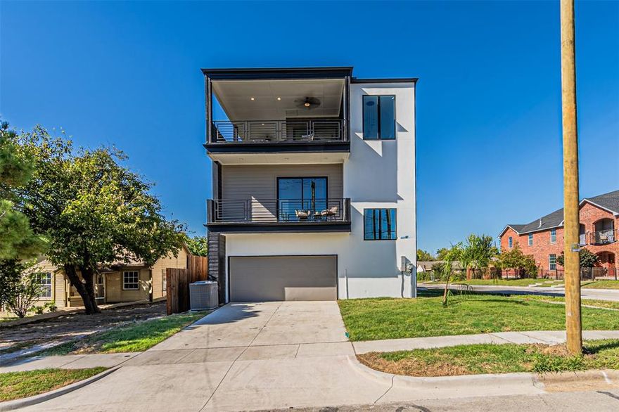 Experience modern luxury at its finest in this newly built 2025 duplex ideally situated between Uptown and the Medical District in the heart of Dallas. This sleek three-story residence blends transitional architecture with refined finishes, just minutes from Oak Lawn, Downtown, and the Design District.

The open-concept first floor features a chef’s gourmet kitchen with quartz countertops, custom cabinetry, a waterfall island, and stainless steel appliances. The spacious living room anchored by a large modern fireplace flows seamlessly into a private fenced backyard, perfect for relaxing or entertaining.

Upstairs, the primary suite boasts a private balcony with stunning city views, a spa-like bathroom with a freestanding tub and porcelain tile, and a generous walk-in closet. A second living space and two additional bedrooms, a hall bath, and laundry room complete the second floor. The third floor offers a large game room, half bath, and rooftop balcony with unmatched skyline views, an entertainer’s dream.

With proximity to Uptown, the Medical District, Old Parkland, the NTTA, I-35, and DART Market Station, this transitioning neighborhood promises exceptional growth and convenience. Discover the perfect balance of design, location, and lifestyle in this architectural gem.