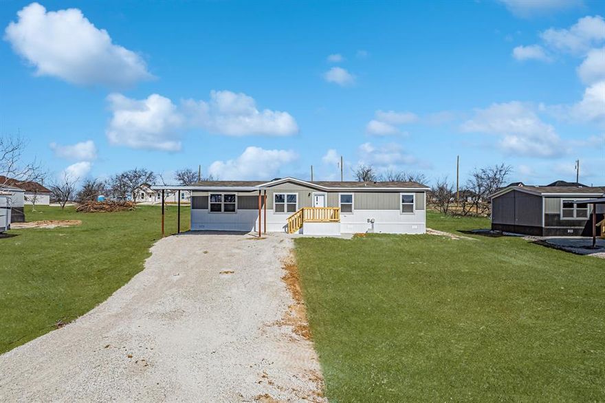 This home provides an open floor plan, which is great for entertaining or anything your heart desires. The kitchen has a refrigerator, dishwasher, range, and island, and a decorative backsplash, perfect for your culinary masterpieces. The den sits adjacent to the kitchen, allowing for access outside to your back. There are four generous-sized bedrooms and 2 bathrooms. The primary bedroom has a private en-suite bathroom with a HUGE walk-in closet! There is a large utility room with plenty of space to have a full-size washer and dryer and still have room to have a freezer. The home is supported by a private septic system and city water provided by the City of Runaway Bay and comes with a one-year manufacturer warranty. The home has many amenities, including a custom 8x8 front deck, a 10x18 covered back deck, smart panel skirting and a 20x20 carport. 
 
 FHA, VA, USDA, and Conventional loans are all welcome!

All information is deemed reliable, and the buyer and buyer’s agent are responsible for verifying all information, including but not limited to the status of construction of the home, lot dimensions, easements, school district, and subdivision restrictions. It is the responsibility of the buyer(s) and the buyer(s) agent to verify the status of completion prior to scheduling site inspections. Some pictures may have AI generated lawn; interior photos are of a staged model home.