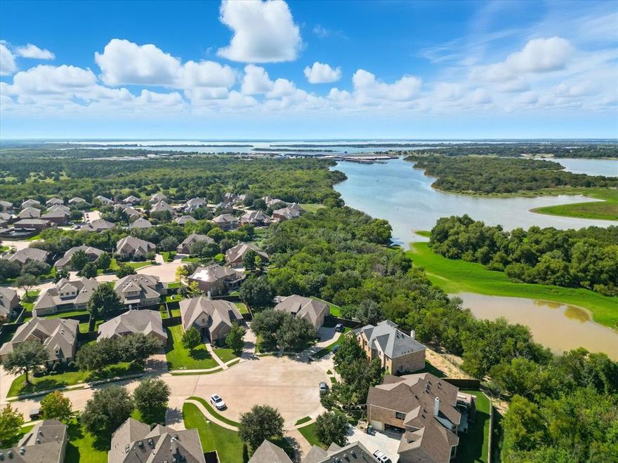 This one-owner Drees custom home offers over 4,000 square feet of flexible living space on a 0.297-acre cul-de-sac lot—featuring 4 bedrooms, 4 full baths, and a rare 4-car garage that’s ideal for car enthusiasts or multi-generational families needing extra parking. Located in a quiet, hidden gem neighborhood, it offers unbeatable commuter access just minutes from Hwy 121 (Sam Rayburn Tollway), I-35, DNT, and DFW Airport.

From the moment you enter, you're greeted by a sweeping curved staircase and soaring ceilings, crown molding and rich hand-scraped hardwood floors.  With multiple living spaces and a formal dining room it is an entertainer's dream!

Easily work from home with TWO dedicated office spaces (one up, one down), a spacious game room, and a main-level media room perfect for movie night, game day, or an in-law suite with adjacent full bath.

The expansive living room is filled with natural light and flows into the open-concept chef’s kitchen, complete with granite countertops, stainless steel appliances, gas cooktop, double ovens, custom cabinetry, and a generous island for gathering. A cozy gas fireplace adds warmth to the inviting layout.

The private primary suite includes a sitting area, updated spa-like bath, soaking tub, walk-in shower, dual vanities, and a custom closet system. Upstairs, you’ll find three more spacious bedrooms—all with walk-in closets—and a large flex or game room. 

Step outside the peaceful covered patio and expansive, pool-sized backyard. Enjoy nearby access to East Hill Park with walking trails, a playground, and open green space.

Centrally located with quick connections to major employers and shopping destinations including Toyota HQ, JPMorgan Chase, The Star, Legacy West, Grandscape, & Stonebriar Centre. Lake Lewisville and Pier 121 Marina are just minutes away for boating, kayaking, and lakeside fun.

Listed $48K below the 2025 Denton Co appraised value—this is an incredible opportunity in a prime location.