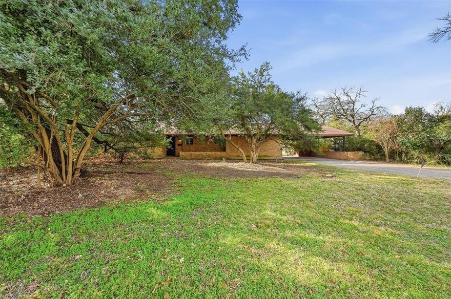 Your mid-century project is here.  This is a redo project but the bones are here! This home is set on just over half acre lot. Great woodwork thru out, big rooms and an open layout with tons of natural light.  The den has a fireplace and could easily accommodate a dining area.  Off the den is a charming study with great built-ins!  Could be a 4th bedroom.  Nice sized secondary bedrooms with lots of storage built-in. The master has a private bath.  Gameroom is huge and is perfect for a pool table or a media room.  Huge storage closet and a small bedroom or office area.  Carport has storage and could easily hold 3 cars.  Huge private lot with room to run and play!
