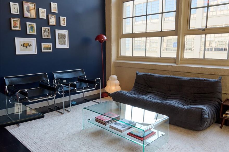 Beautiful listed condo located on the 7th floor at Montgomery Plaza featuring 16 foot ceilings! This 1,263 SF condo features carpet in the bedrooms, large windows in the living area, open kitchen with beautiful back splash, lighting enhancements and granite counter tops, sliding barn door features in the guest bedroom, spa-like bathroom features, master walk-in closet and roller shades in the living area. This condo is perfect for entertaining! 2 side-by-side parking spaces - #2229 and 2230