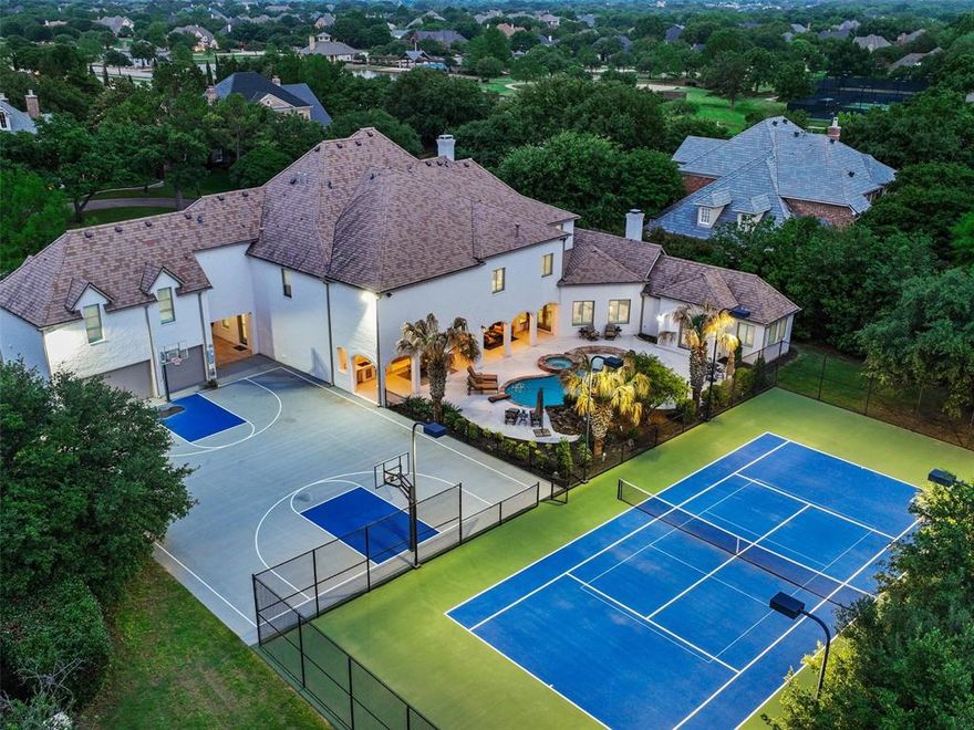 Welcome home to this magnificent, FULLY REMODELED Modern Showplace! Located in one of Southlake's Iconic Gated Enclaves, this Estate has been masterfully reimagined to be a Dream Retreat! Gorgeous finishes, lux marble features & designer touches abound! True Oasis includes a regulation lit Tennis, Pickleball & Basketball Courts, resort Pool & Spa adorned w water & fire features + expansive Motor court. Enter to soaring ceilings, 10ft chandelier inspired by Coco Chanel, impressive Entertaining areas, stunning feature Staircase & perfect Backyard views. Stunning Great Room w welcoming Family Room, gorgeous Bar for entertaining & Chef's Kitchen w 2 islands, top of the line Wolf appliances + tons of storage & counter space. Luxurious Primary Retreat w spacious Sitting rm, Coffee Bar, true Spa Bath w Denali stone soaking tub + 2 DREAM Closets! Priv Guest Casita down is a peaceful retreat. Upstairs features Game Room, Media Room + 3 large Guest suites w Ensuite Baths+ Guest Quarters.