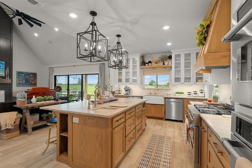 AG EXEMPT! No DEED RESTRICTIONS! Located in the serene countryside of Alvord, this magnificent residence invites you to experience a life of elegance and tranquility. Spanning across 8.5 sprawling acres, this exquisite home offers an unparalleled blend of luxurious living and natural beauty. The heart of this home is undoubtedly its kitchen, a chef's dream come true. Boasting every imaginable custom feature, this culinary haven is equipped to inspire even the most discerning cook. Quartzite countertops, 36 in gas range with 6 burners, 2nd oven, warming drawer, working pantry with lots of shelves and electrical outlets, pull out mixer cabinet and spice drawers, utensil pull outs, soft close drawers, beverage fridge, prep sink with disposal and so much more. From gourmet gatherings to casual family dinners, the kitchen serves as a stunning focal point for memorable experiences. Cozy family room with gas fireplace, and large sliding glass door that opens seamlessly to the patio creating a natural flow between indoor and outdoor spaces. Primary bedroom is tucked away in the back of the home for added privacy. The spa like bathroom features custom cabinetry, quartzite countertops, walk in closet with built in's, a wet room where the tub and shower are in the same space and infrared warming lights to keep you warm year round. Two secondary bedrooms are on the opposite side of the house with a Jack n' Jill bath between rooms. The guest room is great for friends and family or would also make a great office.  Upstairs is a large game room with a mini split HVAC system so you can completely close off the space if not in use. Enjoy coffee on the back patio while taking in the picturesque setting of this amazing property. 2 car garage plus 3 car carport! Endless opportunities for outdoor enjoyment and entertainment! Bring your animals, fenced pasture in the back is ready to go! Spray Foam Insulation! No Carpet! LOTS of storage space!