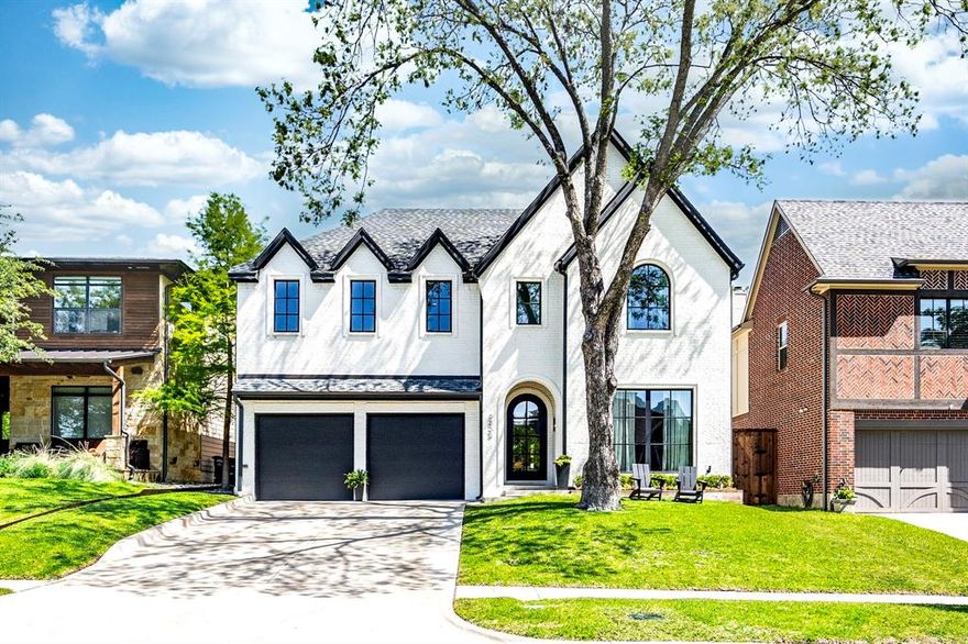 Welcome home to this stunning, 2021 custom built-home by Gramercy Custom Homes where luxury and modern design intertwine. Nestled on an elevated lot just half a block from Lakewood Country Club and 3 blocks from gorgeous Lindsley Park and Santa Fe Trail.  Open concept kitchen features quartz countertops, soft close cabinetry and huge, room-sized pantry. Expansive living space overlooks the sparkling, newly constructed pool and outdoor living space with built-in grill. Upstairs you will find a versatile flex space-playroom and 4 bedrooms each with ensuite baths. Private master retreat is complete with luxurious marble, soaking tub and massive walk-in closet. Unique and desirable guest suite downstairs also has its own ensuite bath, which conveniently doubles as a pool bath. Custom, designer touches throughout add to over $175k worth of upgrades post build. With 4 inch white oak flooring, oversized 2 car garage, and smart home features, this home truly is the complete Lakewood package.