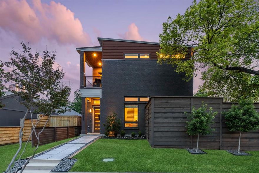 Perfectly situated in the vibrant East Village neighborhood, this exceptional home is a blend of modern design & luxurious comfort. Upon entering, you're greeted by 11’ ceilings, a private study, & an open layout centered around a striking double-sided floor-to-ceiling fireplace. The chef’s kitchen is equipped w quartz countertops, a large island, stainless steel appliances, & a built-in wine fridge. Ideal for hosting, the home is flanked by a side patio deck & a beautifully landscaped romantic courtyard. Upstairs houses 3 en-suite bedrooms, along w spacious laundry room. The primary suite offers a cozy sitting area & a private balcony w views of the Dallas skyline. The primary bathroom is a spa-like retreat, complete w an oversized shower, soaking tub, dual vanities, & an expansive walk-in closet. There are ample storage opportunities throughout the home. An integrated Google Nest smart home system offers seamless control over the home’s automation features. An absolute must-see!