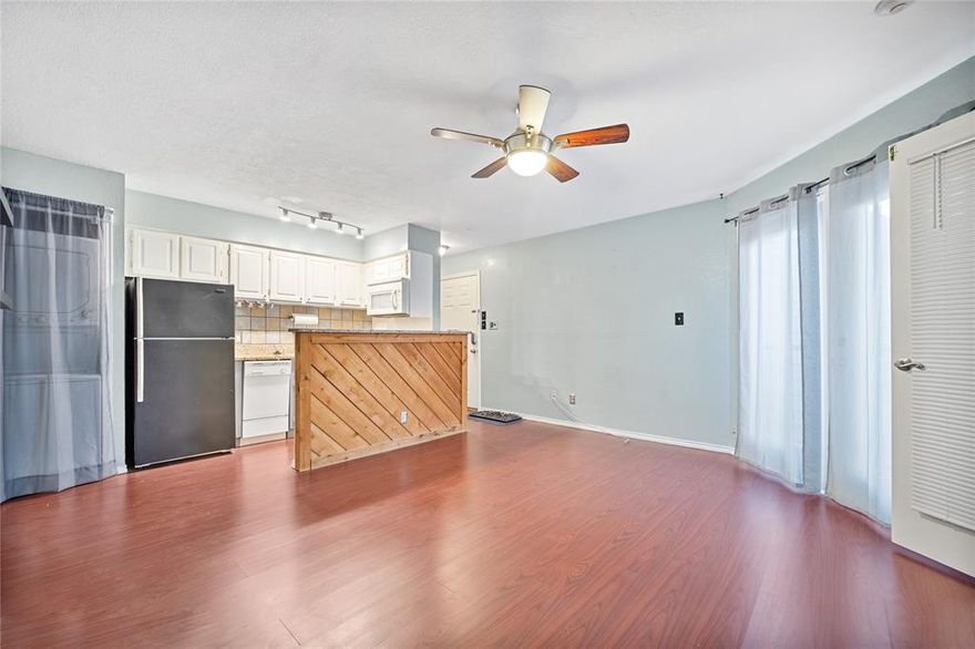 Welcome Home to Arlington Oaks Condominiums third floor 1BR 1BA condo in the growing area of North Arlington! Kitchen opens to a cozy living room with an abundance of natural light. Grand bedroom entry with two french doors opening to a charming room with a wood accent wall! Laminate wood flooring throughout, with carpet in the bedroom, and tile in the bathroom. Updated in all the right places - this unit is sure to feel like home! Unit comes with 1 assigned non-covered parking space near unit and washer and dryer stay in the unit. This community offers great amenities, swimming pools, lighted tennis court, jacuzzi hot tubs, workout facility, private grassy picnic area with outside fireplace, water, trash, sewer included in monthly HOA dues, which are included in rent! Close to Globe Life Park, ATT Stadium, dining, and major highway 360. Don't let this one slip away, schedule appointment today. Refrigerator, washer, and dryer convey with sale.
