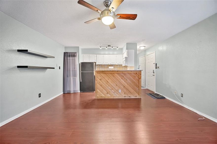 Welcome Home to Arlington Oaks Condominiums third floor 1BR 1BA condo in the growing area of North Arlington! Kitchen opens to a cozy living room with an abundance of natural light. Grand bedroom entry with two french doors opening to a charming room with a wood accent wall! Laminate wood flooring throughout, with carpet in the bedroom, and tile in the bathroom. Updated in all the right places - this unit is sure to feel like home! Unit comes with 1 assigned non-covered parking space near unit and washer and dryer stay in the unit. This community offers great amenities, swimming pools, lighted tennis court, jacuzzi hot tubs, workout facility, private grassy picnic area with outside fireplace, water, trash, sewer included in monthly HOA dues, which are included in rent! Close to Globe Life Park, ATT Stadium, dining, and major highway 360. Don't let this one slip away, schedule appointment today. Refrigerator, washer, and dryer convey with sale.