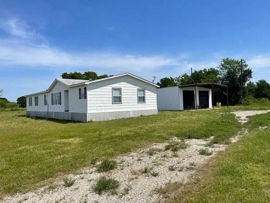 Country comfort meets everyday convenience on this beautiful 7.69 acre property just minutes from I 30. This spacious 4 bedroom, 3 bath home offers an inviting layout with both a dedicated office featuring built ins and a cozy den anchored by a woodburning fireplace. The primary suite includes a relaxing garden tub, separate shower, and generous space to unwind.

A 20x30 metal building with two garage bays adds incredible functionality for storage, projects, or equipment. With wide open acreage that may offer future subdivision potential, this property provides room to grow, explore, and create the lifestyle you’ve been dreaming of.

Enjoy peaceful country living while staying close to the conveniences of Caddo Mills just 2 miles away. A planned residential community borders the rear of the property, offering promising long term appeal. Buyer and buyers agent to verify all details.