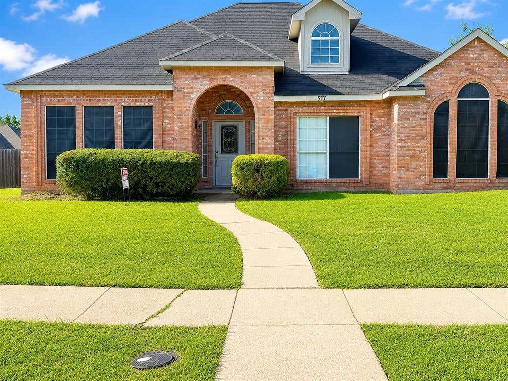 Photo of 517 E Grubb Drive, Mesquite, TX 75149 (MLS # 21344677)