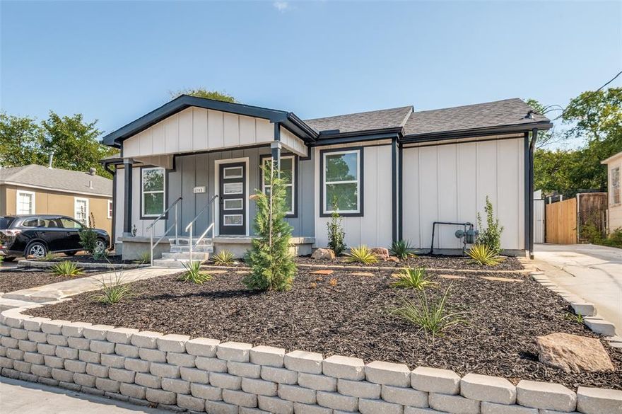 In the Heart of Oak Cliff!  This beautifully updated 4-bedroom, 2-bath home blends old world charm and modern comfort. Step inside and be welcomed by tray ceilings throughout, creating an airy, upscale feel in every room. The open-concept kitchen is a true centerpiece, featuring a spacious island, quartz countertops, new cabinets, stainless steel appliances, including the refrigerator, and sleek recessed lighting! The living area is warm and inviting with an electric fireplace, while the bathrooms impress with LED lighted mirrors and stylish finishes. New flooring runs seamlessly throughout, adding a fresh and modern touch. A thoughtfully designed utility room with built-in cabinets provides extra storage and functionality. This home has been meticulously renovated with new plumbing, electrical, windows, doors, roof, and siding, giving you peace of mind for years to come. Outside, enjoy an ample concrete pad in the back for parking, a rare find in this highly sought-after neighborhood. Located in the vibrant heart of Oak Cliff, this home offers not only stunning features but also the convenience of being close to parks, dining, and everything Dallas has to offer. All information contained herein deemed reliable but not guaranteed. Buyer(s) and Buyers agent to verify all information including schools, square footage, dimensions, etc.