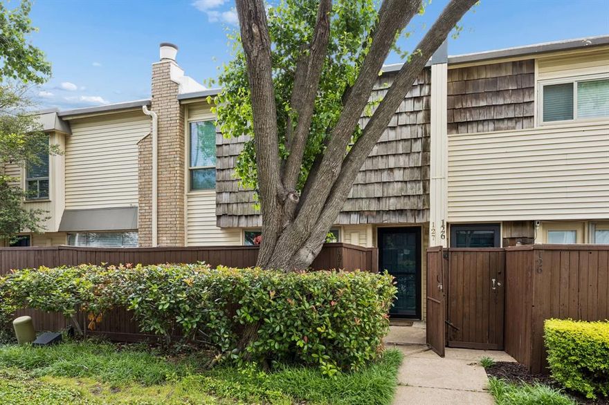Close proximity to Oak Lawn with the added bonus of two private outdoor spaces, perfect for effortless indoor-outdoor living. This 2 bed, 1.5 bath condo features striking finishes, statement fixtures, and a bright open layout with oversized windows. The kitchen is equipped with a large granite breakfast bar, stainless steel appliances, and direct access to the back patio—ideal for entertaining. Upstairs, the primary suite offers a custom walk-in closet, paired with a versatile second bedroom or office. Covered parking, a gated tree-lined community, and easy access to the Tollway, Design District, dining, and grocery.